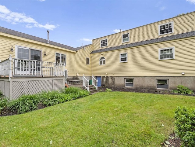 47 Skelton Rd, Burlington, MA 01803 - rear view of house featuring a yard and a wooden deck