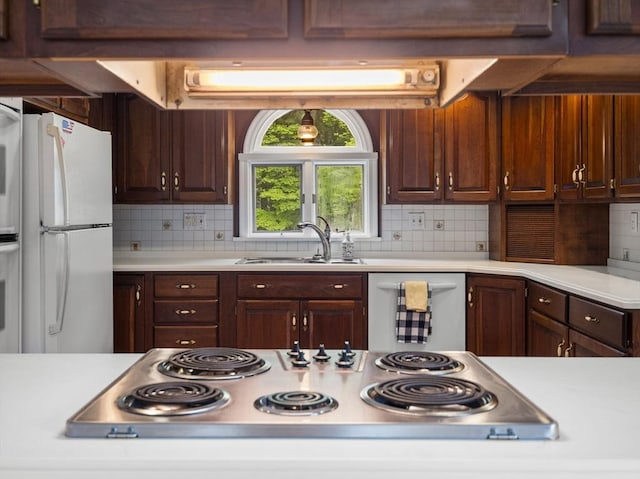 47 Skelton Rd, Burlington, MA 01803 - kitchen featuring stainless steel appliances, light countertops, and tasteful backsplash