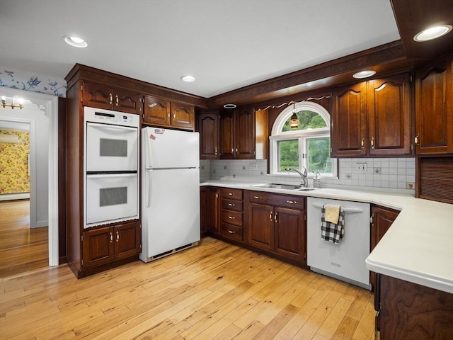 47 Skelton Rd, Burlington, MA 01803 - kitchen featuring white appliances, light countertops, light wood finished floors, tasteful backsplash, and recessed lighting