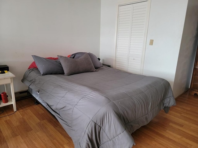 bedroom with light wood-type flooring