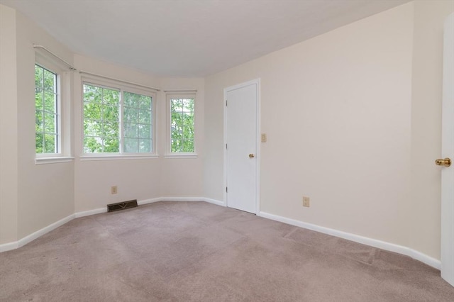 118 Tall Oaks Dr Unit D, Weymouth, MA 02190 - carpeted spare room featuring baseboards