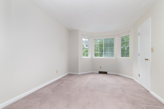 118 Tall Oaks Dr Unit D, Weymouth, MA 02190 - unfurnished room with light carpet and baseboards