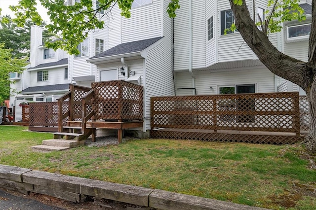 118 Tall Oaks Dr Unit D, Weymouth, MA 02190 - rear view of house featuring a deck and a lawn