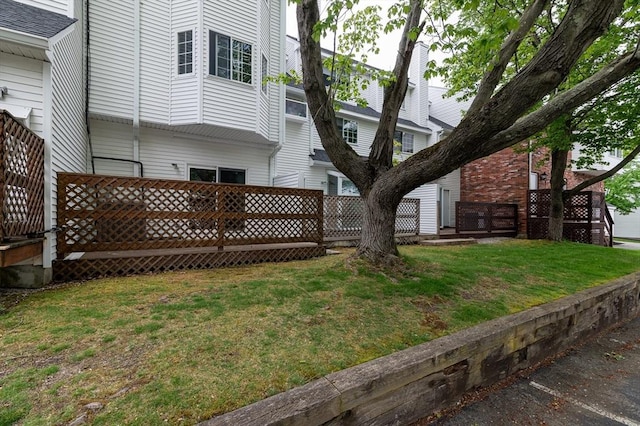 118 Tall Oaks Dr Unit D, Weymouth, MA 02190 - view of grassy yard featuring a deck