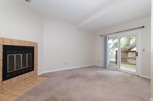 118 Tall Oaks Dr Unit D, Weymouth, MA 02190 - unfurnished living room with carpet flooring, baseboards, and a fireplace