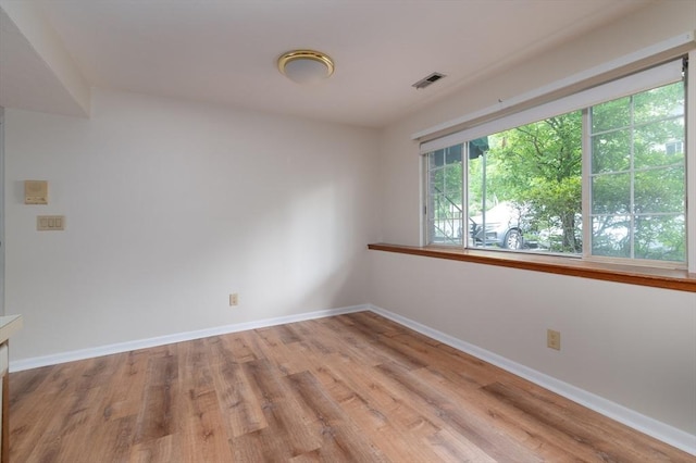 118 Tall Oaks Dr Unit D, Weymouth, MA 02190 - spare room with baseboards and wood finished floors
