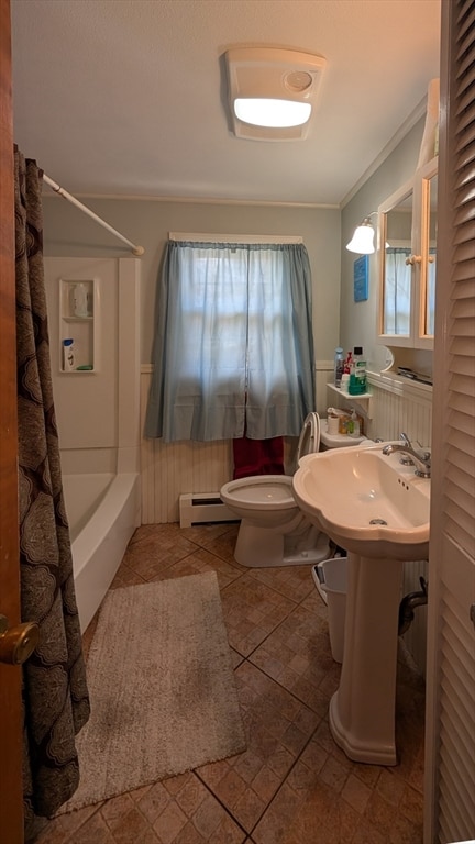 bathroom featuring toilet, tile patterned flooring,  shower combination, and a baseboard heating unit