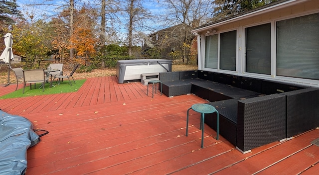 deck with a hot tub