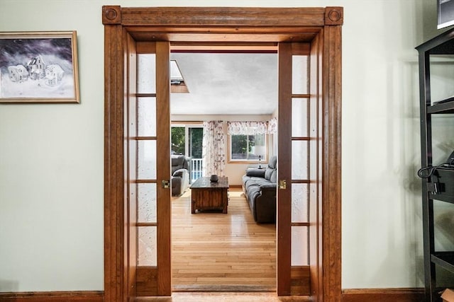 14 Giles Ave, Beverly, MA 01915 - doorway featuring french doors and wood finished floors