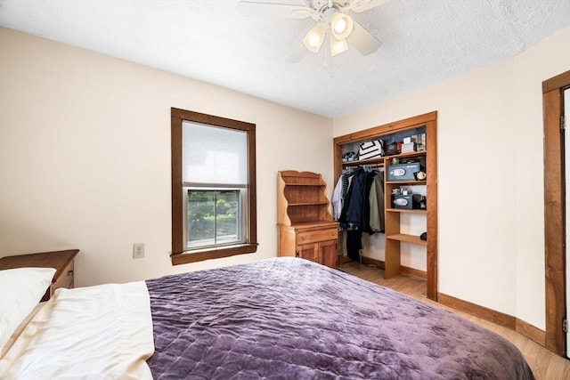 14 Giles Ave, Beverly, MA 01915 - bedroom with wood finished floors, ceiling fan, and a closet