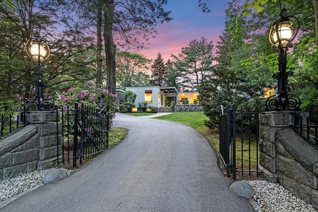 228 Atlantic Ave, Swampscott, MA 01907 - view of asphalt driveway with a gate and a gated entry