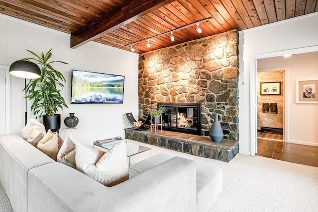 228 Atlantic Ave, Swampscott, MA 01907 - carpeted living area featuring wood ceiling with exposed beams, a fireplace, rail lighting, and baseboards