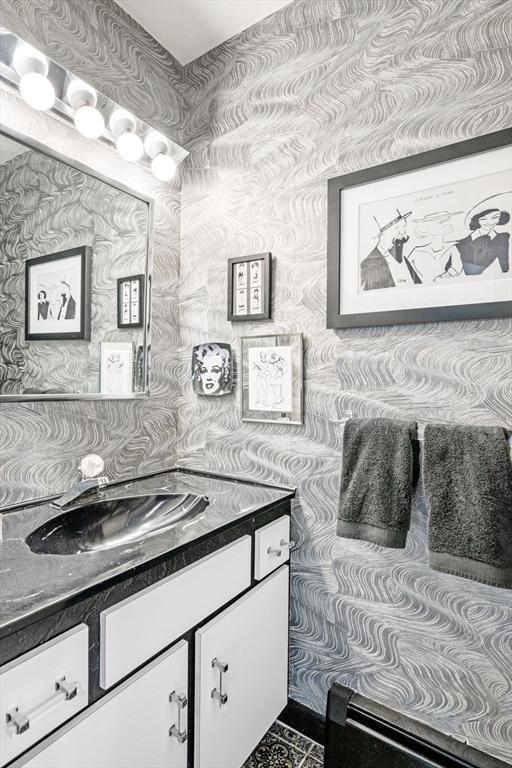 228 Atlantic Ave, Swampscott, MA 01907 - bathroom featuring vanity and wallpapered walls