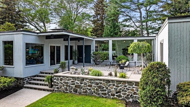 228 Atlantic Ave, Swampscott, MA 01907 - rear view of house featuring a patio
