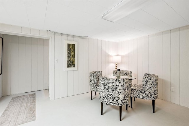 228 Atlantic Ave, Swampscott, MA 01907 - carpeted dining area featuring wood walls