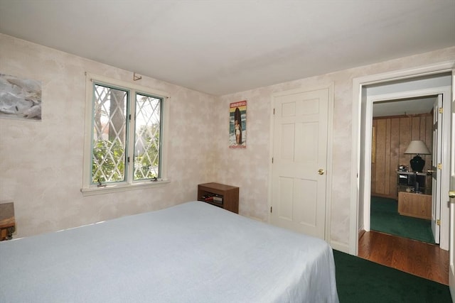 bedroom featuring wood finished floors