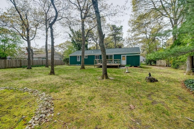 view of yard featuring a wooden deck