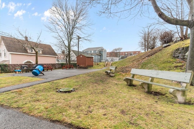 view of yard with a patio area and a shed