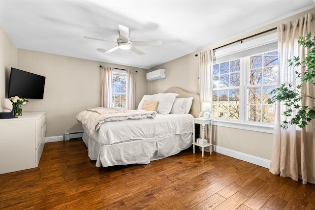 bedroom with an AC wall unit, ceiling fan, dark hardwood / wood-style flooring, multiple windows, and a baseboard heating unit