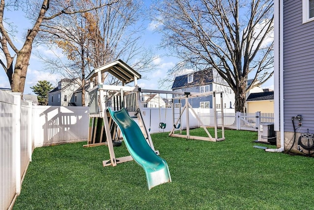 view of jungle gym with cooling unit and a lawn