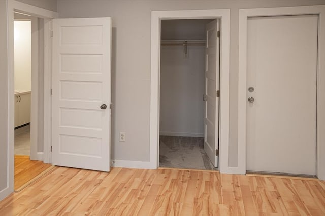 500 W St Unit 6, Amherst, MA 01002 - unfurnished bedroom with wood finished floors and baseboards