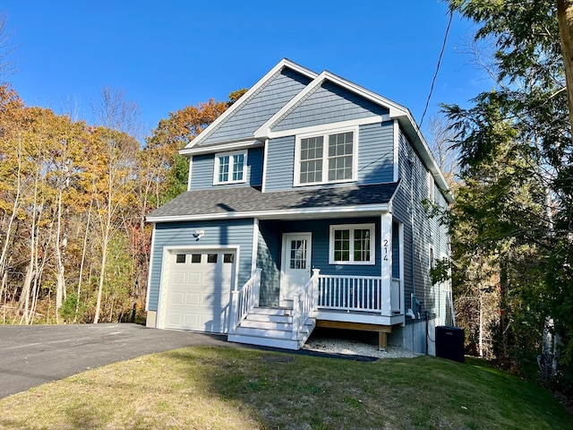 view of front of house featuring a porch and a front lawn