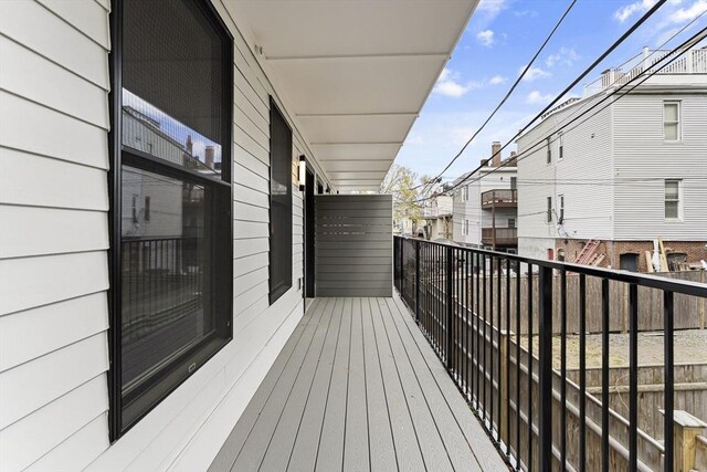 balcony featuring a residential view
