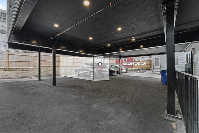 parking deck featuring fence