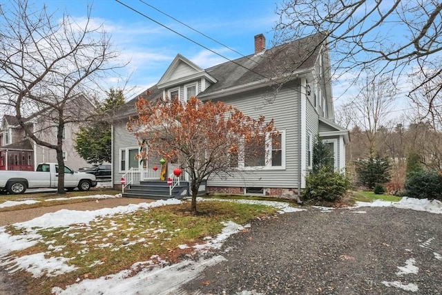 view of front property featuring covered porch