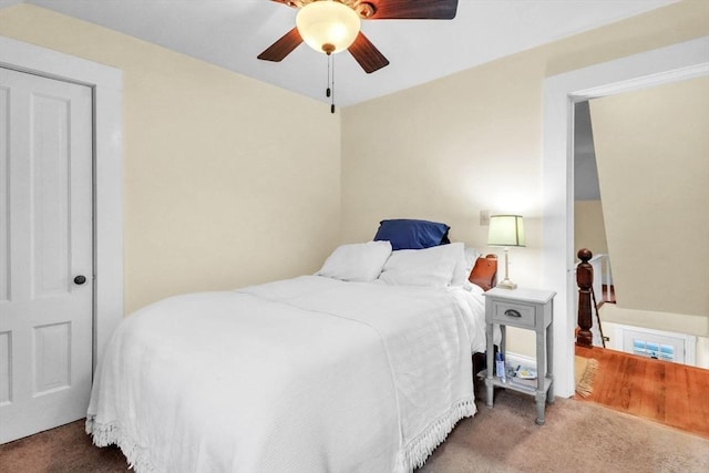 carpeted bedroom with ceiling fan