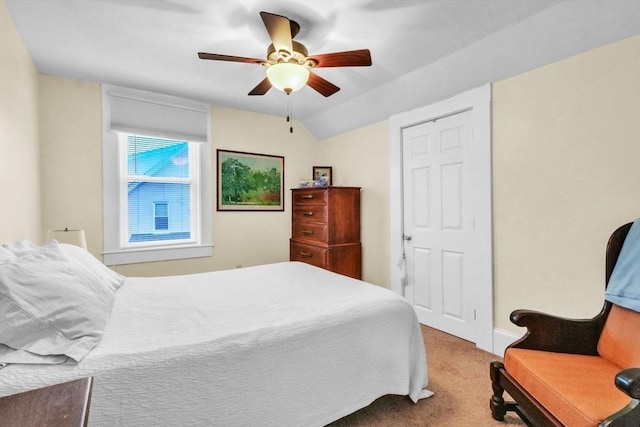 bedroom with carpet, ceiling fan, and lofted ceiling