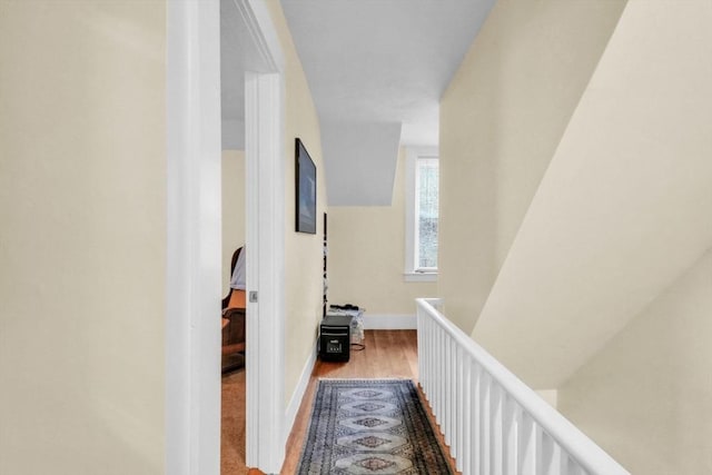 hallway with wood-type flooring