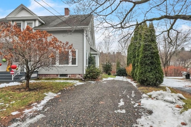 view of snow covered property