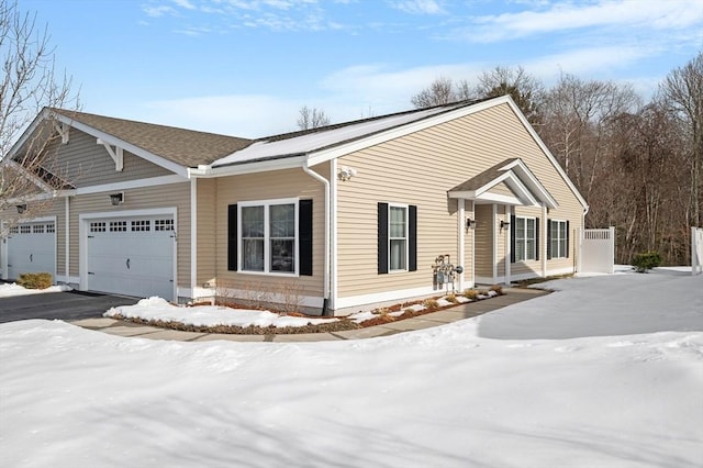 view of front facade featuring an attached garage and driveway