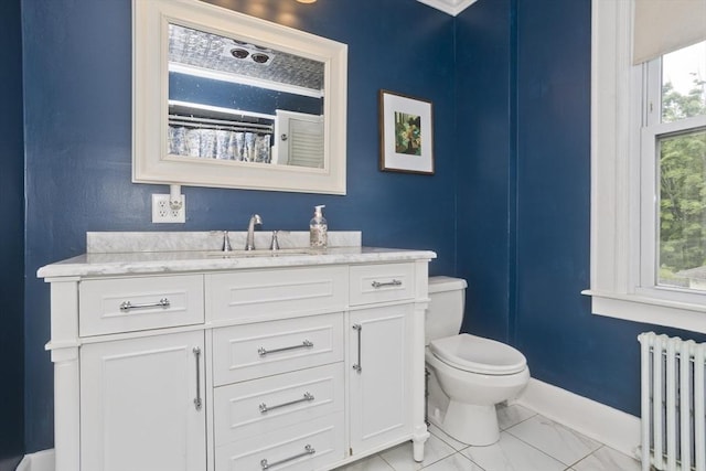 104 Longmeadow St, Longmeadow, MA 01106 - bathroom featuring radiator heating unit, vanity, and marble finish flooring