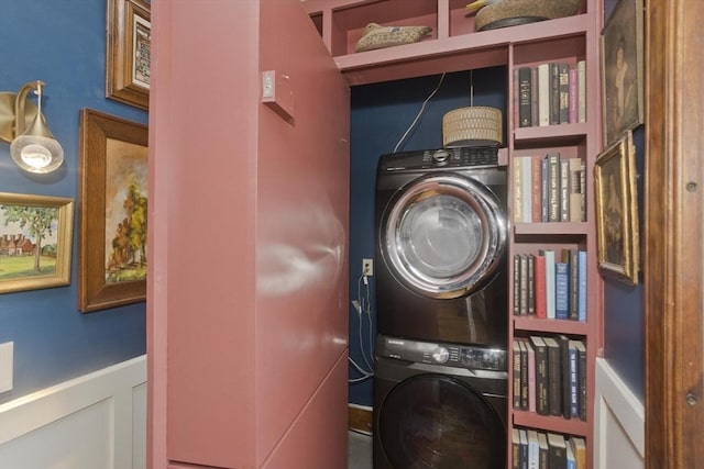 104 Longmeadow St, Longmeadow, MA 01106 - washroom featuring stacked washer / dryer and wainscoting