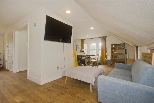 104 Longmeadow St, Longmeadow, MA 01106 - living room with lofted ceiling, wood finished floors, and recessed lighting