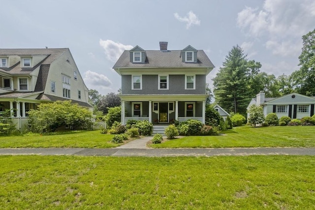 104 Longmeadow St, Longmeadow, MA 01106 - shingle-style home featuring a porch, a front lawn, and a chimney