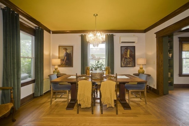 104 Longmeadow St, Longmeadow, MA 01106 - dining room featuring a chandelier, a wall unit AC, radiator heating unit, ornamental molding, and healthy amount of natural light