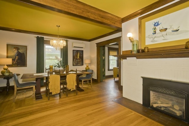 104 Longmeadow St, Longmeadow, MA 01106 - dining area with a wall unit AC, a chandelier, crown molding, plenty of natural light, and beamed ceiling