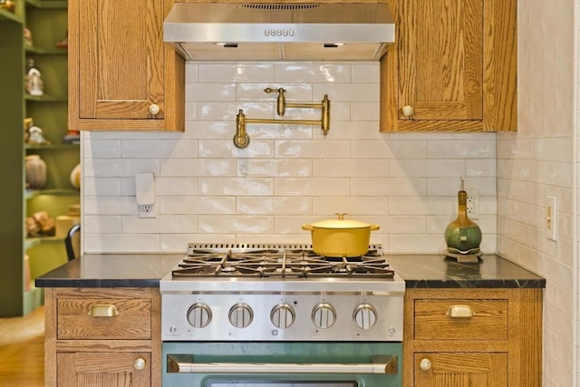 104 Longmeadow St, Longmeadow, MA 01106 - kitchen featuring exhaust hood, stove, decorative backsplash, and brown cabinets