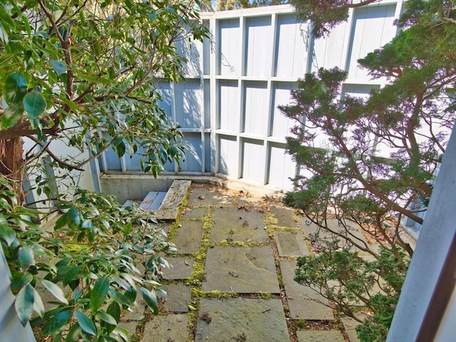 view of property exterior featuring a patio area