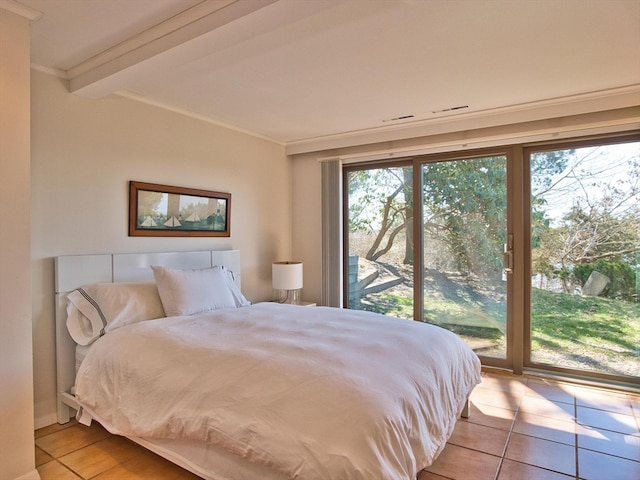 tiled bedroom featuring access to outside and beamed ceiling