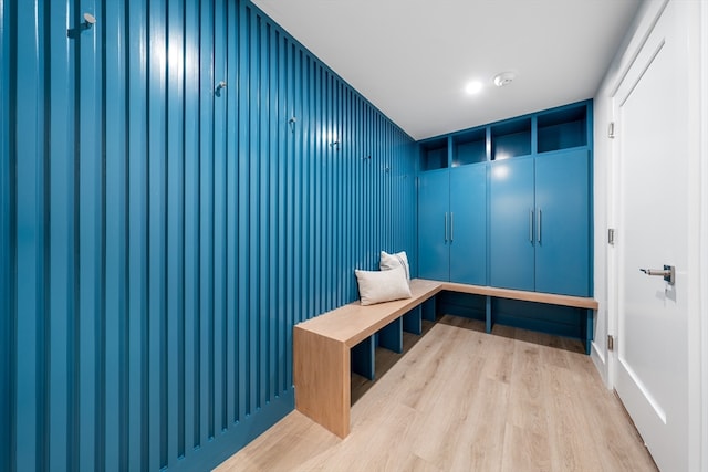 mudroom with light hardwood / wood-style flooring