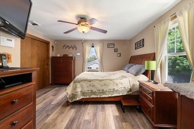34 Robert Bigelow St, Chelmsford, MA 01824 - bedroom with wood finished floors and ceiling fan