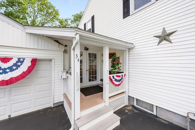 34 Robert Bigelow St, Chelmsford, MA 01824 - entrance to property featuring a garage