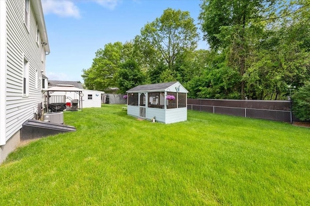 34 Robert Bigelow St, Chelmsford, MA 01824 - view of yard featuring an outdoor structure and central AC unit