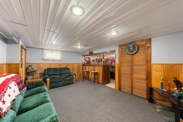 34 Robert Bigelow St, Chelmsford, MA 01824 - carpeted living room featuring wood walls and wainscoting