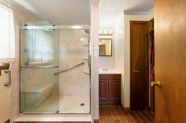 34 Robert Bigelow St, Chelmsford, MA 01824 - full bath featuring crown molding, a shower stall, wood finished floors, and vanity