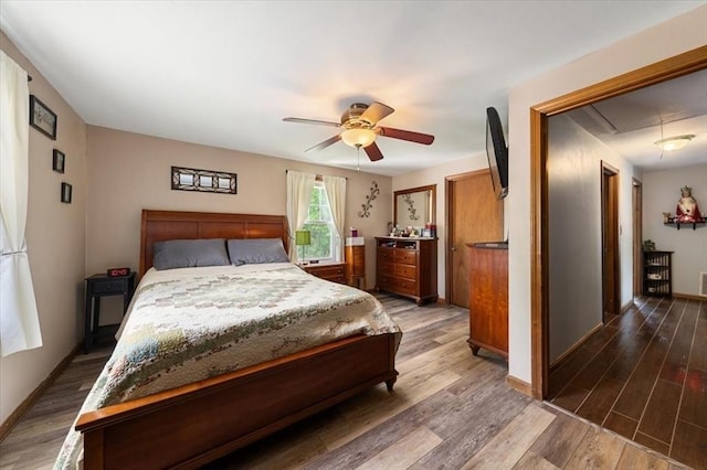 34 Robert Bigelow St, Chelmsford, MA 01824 - bedroom featuring wood finished floors, baseboards, attic access, and a ceiling fan